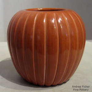 Carved red melon jar