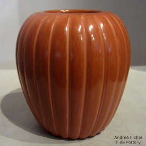 Carved red melon jar