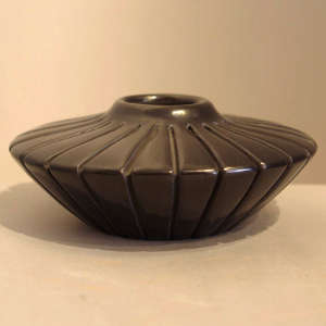 Flat-topped carved black jar