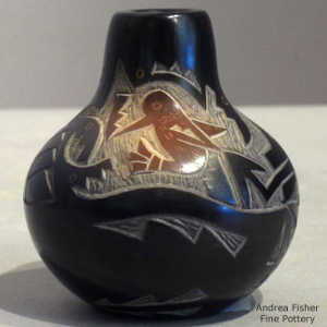 Sienna spot and sgraffito hummingbird and avanyu design on a black seed pot