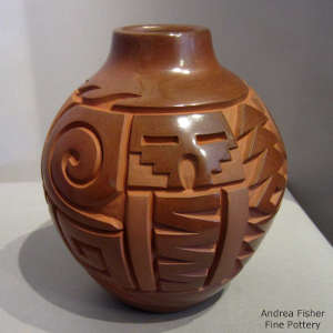 Tularosa spiral, kiva-swtep and geometric design carved into a polished red jar