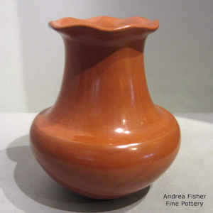 Classic red water jar with a pie crust rim