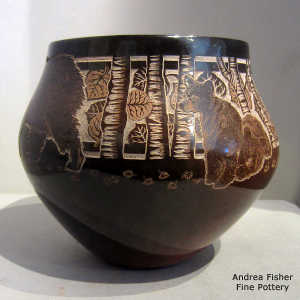 Sgraffito bear and nature design on a sienna jar