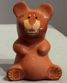Sgraffito design on a polished red bear with a micaceous slip