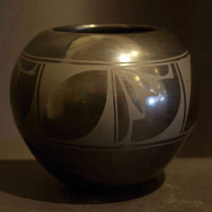 Geometric design on a black on black jar