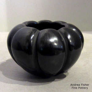 Black carved melon jar