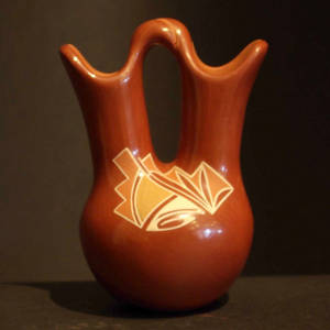 Geometric designs on a polychrome redware wedding vase