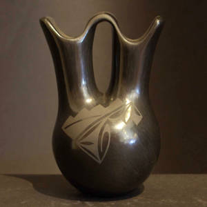 Geometric design on a black on black wedding vase