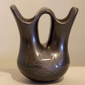 Geometric design on a black on black wedding vase