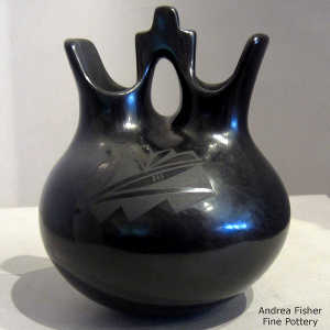 Kiva step and geometric design on a black on black wedding vase
