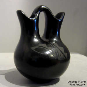 Kiva step and geometric design on a black on black wedding vase