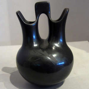 Geometric design on a black on black wedding vase