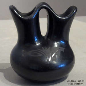 Kiva step and geometric design on a black on black wedding vase