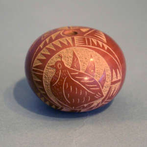 Sgraffito quail and geometric design on a red seed pot
