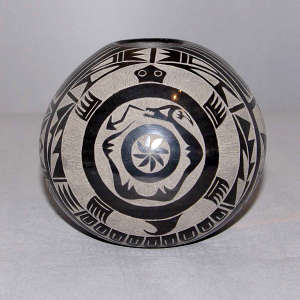 Sgraffito turtle, avanyu and geometric design on a black seed pot