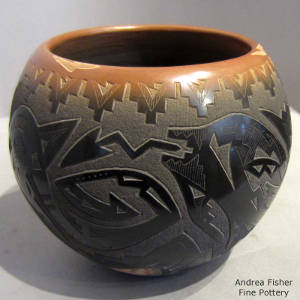 Sgraffito bear paws, kiva step, avanyu and geometric designs decorate a black jar with sienna rim and spots