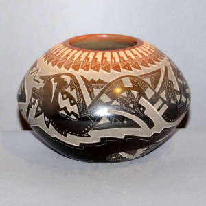 Sgraffito avanyu, feather, bear paw and geometric design on a black jar with a sienna rim