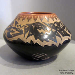 Sgraffito avanyu, bear paw, kiva step and geometric design on a black jar with a sienna rim