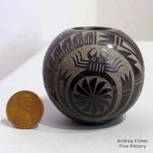 Sgraffito Mimbres cricket, water bug and geometric design on a miniature black pot