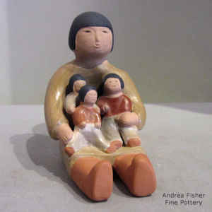 3 children on a grandmother storyteller