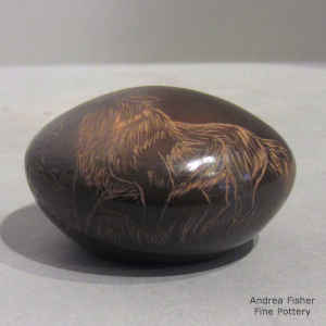 Sgraffito wolf and nature design on a miniature sienna seed pot