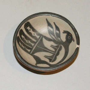 Turkey design inside a small polychrome bowl