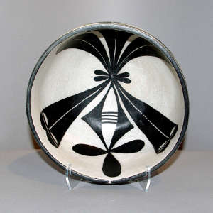 Geometric design inside and outside a polychrome bowl