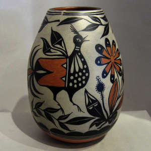 Bird and floral design on a polychrome jar