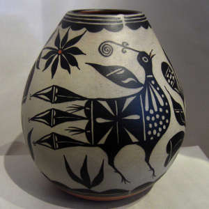 Bird and floral design on a polychrome jar
