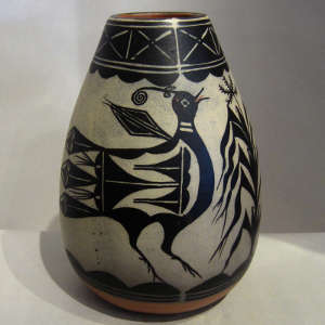 Bird and floral design on a polychrome jar
