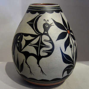 Bird and floral design on a polychrome pot