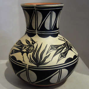Bird and geometric designs on a polychrome jar