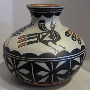 Bird, floral and geometric design on a polychrome jar