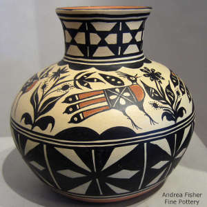 Bird, floral and geometric design on a polychrome jar