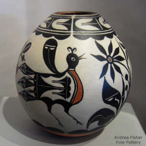 Bird, floral and geometric design on a polychrome jar