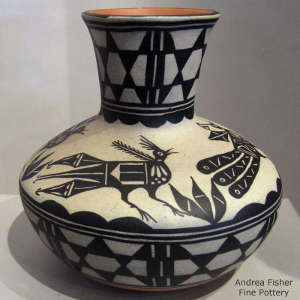 Bird, floral and geometric design on a polychrome jar