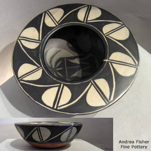 Flower design inside and geometric design outside on a polychrome flat top jar