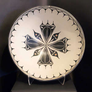 Cloud and geometric design inside a large polychrome bowl