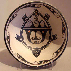 Turtle and water design inside, water design outside on a polychrome stew bowl