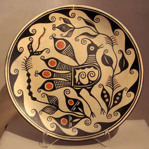 Bird, plant and geometric design on a polychrome plate