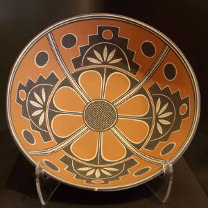 Geometric design inside and out on a polychrome bowl