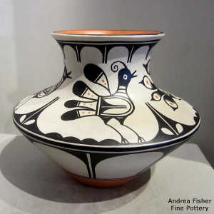 Black and white bird and geometric design on a polychrome jar