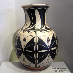 Moth, water, cloud and geometric design on a polychrome jar