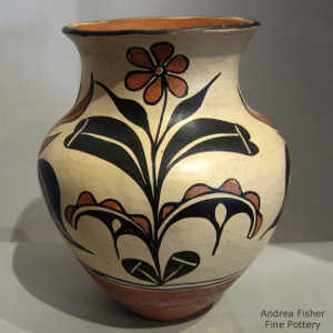 Floral and geometric design on a polychrome jar