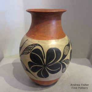 Polychrome water jar decorated with a flower and leaf design