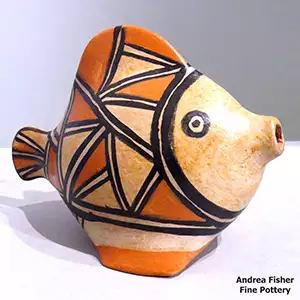Geometric design on a polychrome fish effigy