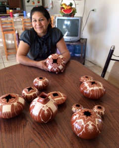 Avelina Corona at her kitchen table Mata Ortiz potter Avelina Corona