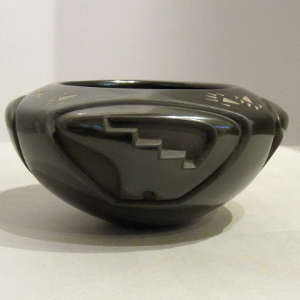 Red clay body turned black in an oxygen reduction atmosphere, Click to see a larger version An oxygen reduction atmosphere turned this red clay body black
