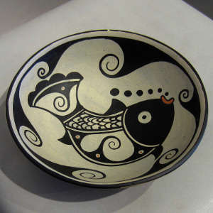 Polychrome bowl with fish and water designs inside, water designs outside, Click to see a larger version Fish and water designs inside and water design outside on a polychrome bowl