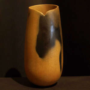 Fire clouds on a micaceous clay cylinder